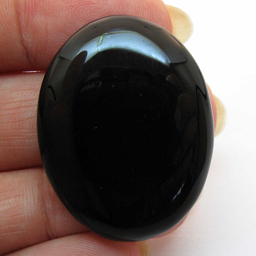 Kabošon černý onyx ovál 33mm — foto 1