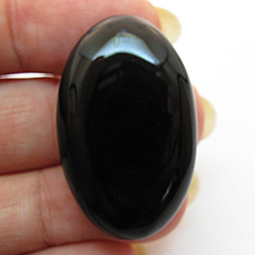 Kabošon černý onyx ovál 33mm — foto 1
