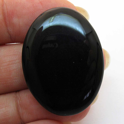 Kabošon černý onyx ovál 33mm — foto 1