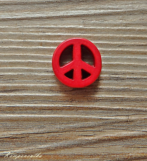 Howlitový znak svobody 12mm 1kus — foto 1