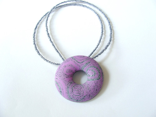 Lila donutek — foto 1