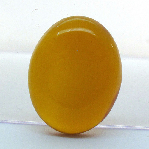 Kabošon žlutý onyx ovál 21,8mm