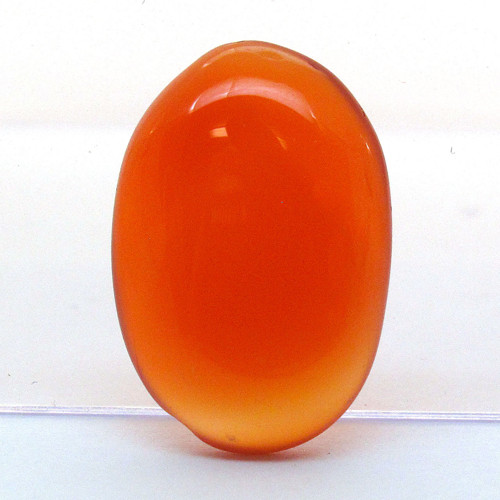 Kabošon oranžový onyx ovál 20,2mm