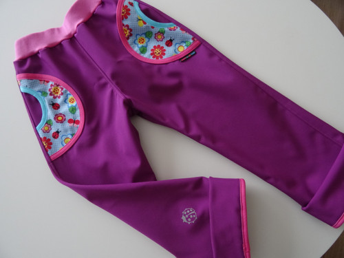 Softshellové kalhoty lila s beruškami — foto 1