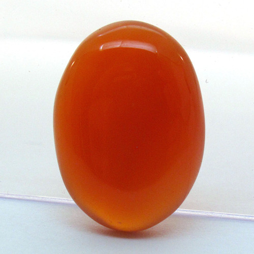 Kabošon oranžový onyx ovál 20,5mm