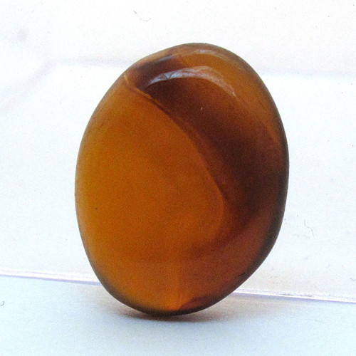 Kabošon hnědý onyx ovál 18,7mm