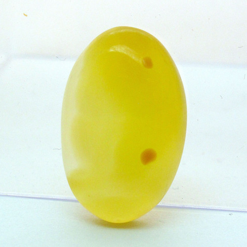 Kabošon žlutý onyx ovál 24,5mm