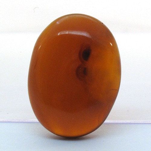 Kabošon hnědý onyx ovál 22mm