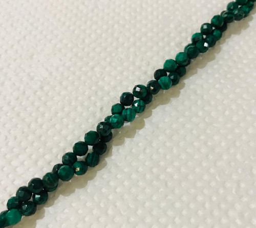 Malachit broušené kuličky 4mm - pár — foto 1