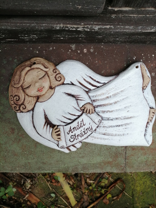 Andílek letící , reliéf — foto 1