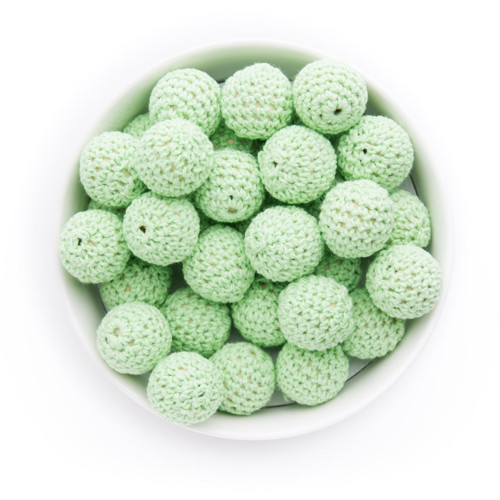 Háčkované korálky(1pár)-pr.20mm-pale green(č.1) — foto 1