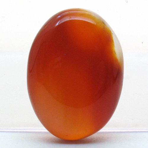 Kabošon oranžový onyx ovál 21mm