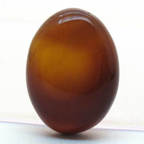 Kabošon hnědý onyx ovál 19mm