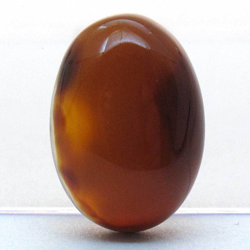 Kabošon hnědý onyx ovál 16mm