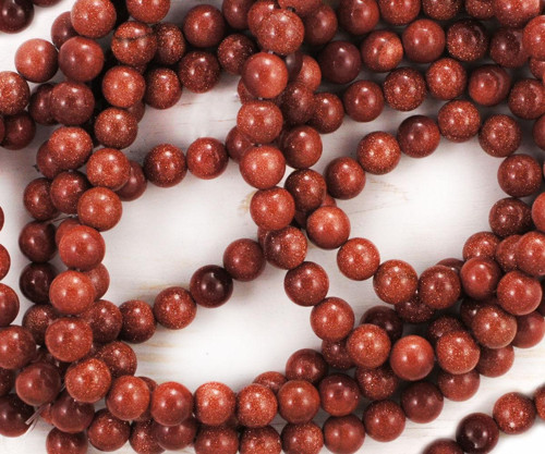 Hladké kulaté korálky, hnědý goldstone, průměr 8