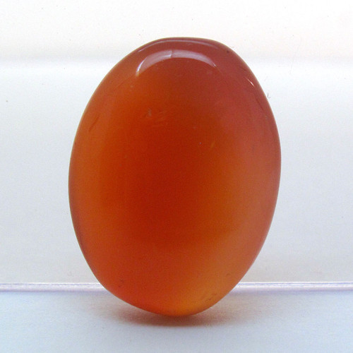 Kabošon oranžový onyx ovál 19mm