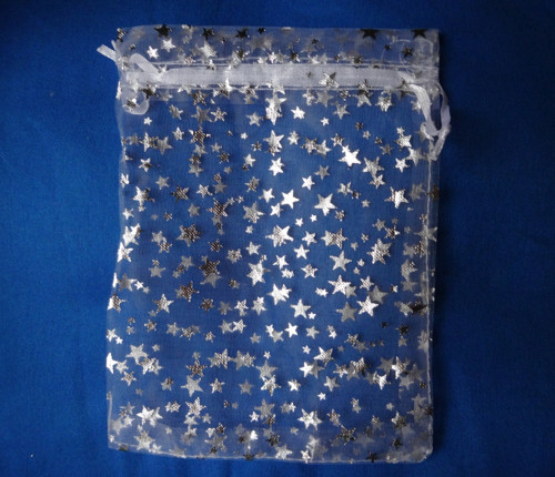 Hvězdičky stříbrné - bílý sáček (8x11)