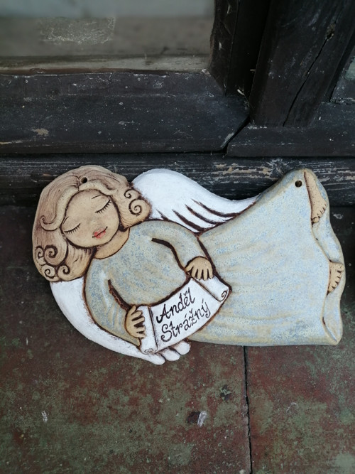 Andílek letící , reliéf — foto 1