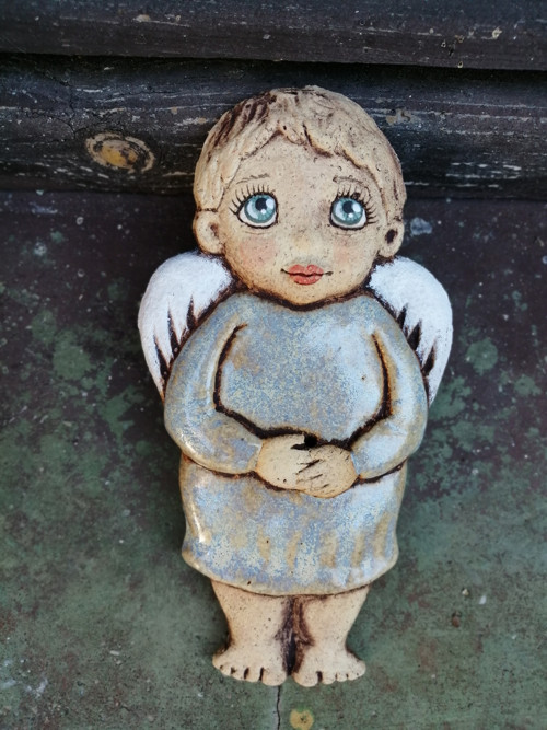 Andílek buclatý , reliéf — foto 1
