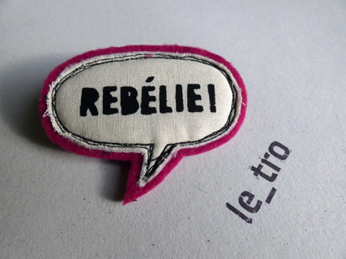 Brož REBÉLIE! — foto 1