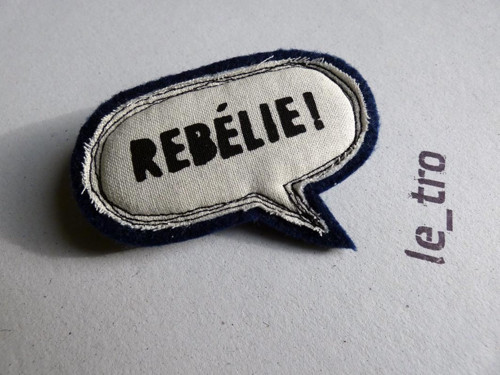 Brož REBÉLIE! — foto 1