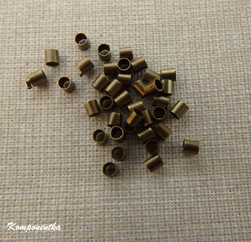 Kovový korálek zamačkávací rokajl 1,5mm 50kusů