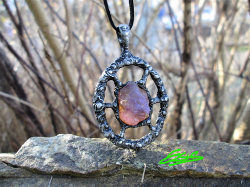Talisman ,, Evoluce " — foto 1