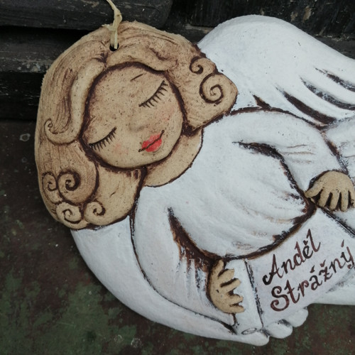 Andílek letící , reliéf — foto 1
