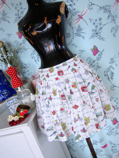 Sukénka vintage rozverná — foto 1