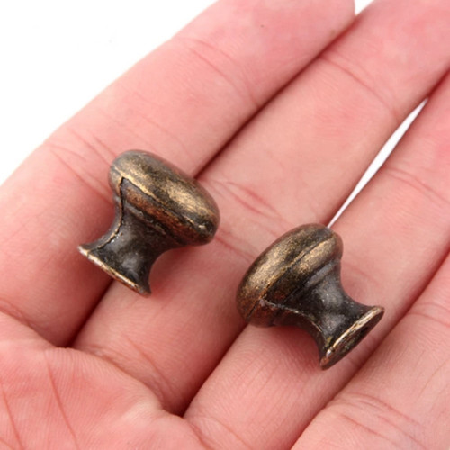 Kovové ozdobné úchytky 19x14mm, bronz