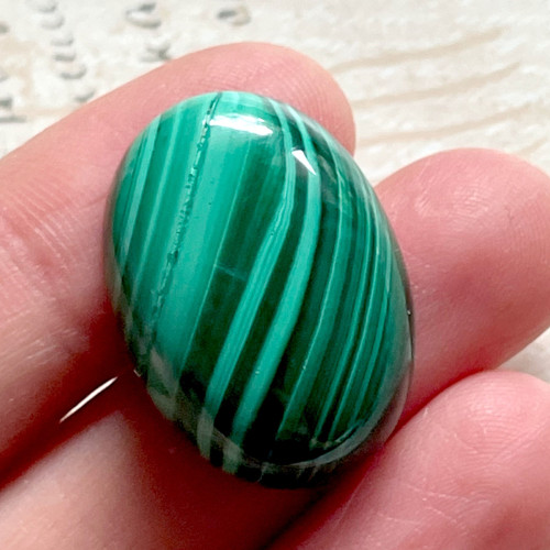 Malachit pravý kabošon ovál / 25x18mm — foto 1