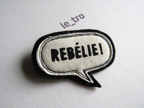 Brož REBÉLIE! — foto 1