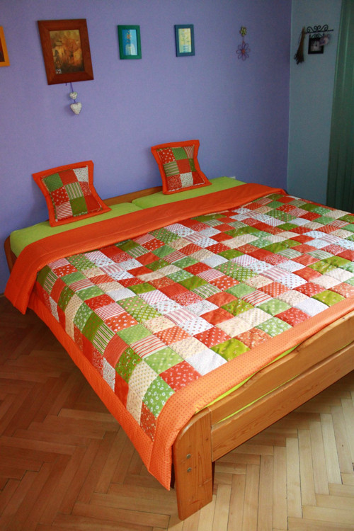 Oranžový patchwork přehoz či přikrývka
