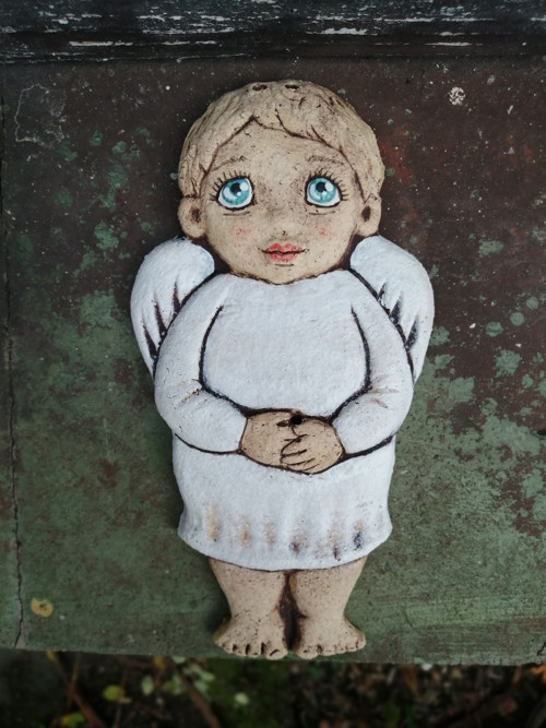 Andílek buclatý , reliéf — foto 1