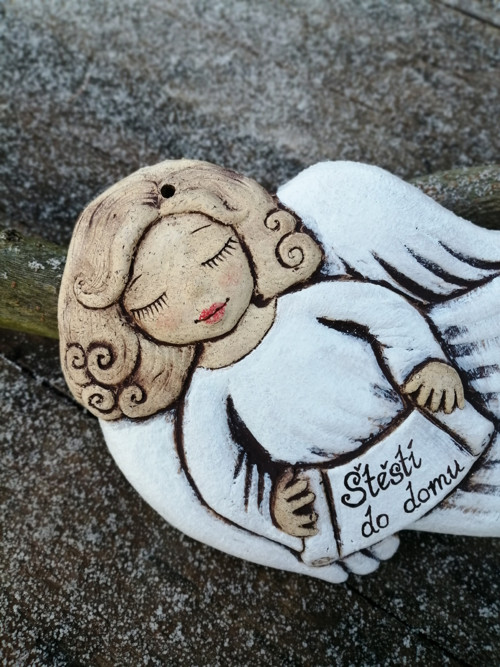 Andílek letící , reliéf — foto 1
