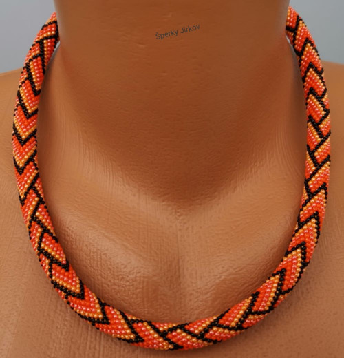 Oranžová klikačka.