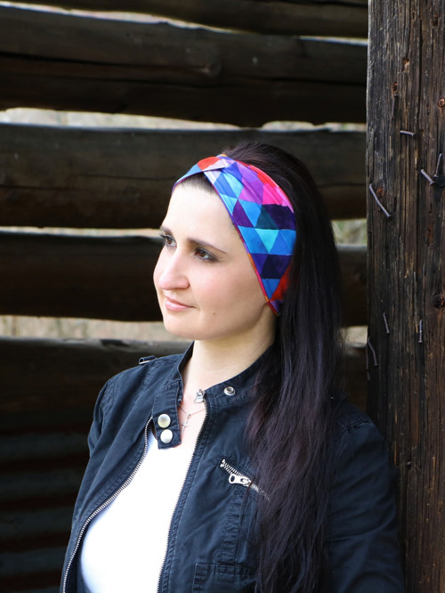 Prekrížená úpletová čelenka trojuholníky modré