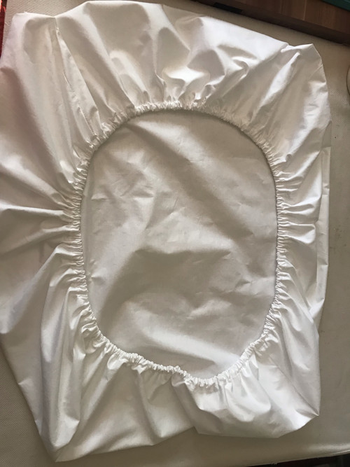 Bílé prostěradlo do malé postýlky 60x70