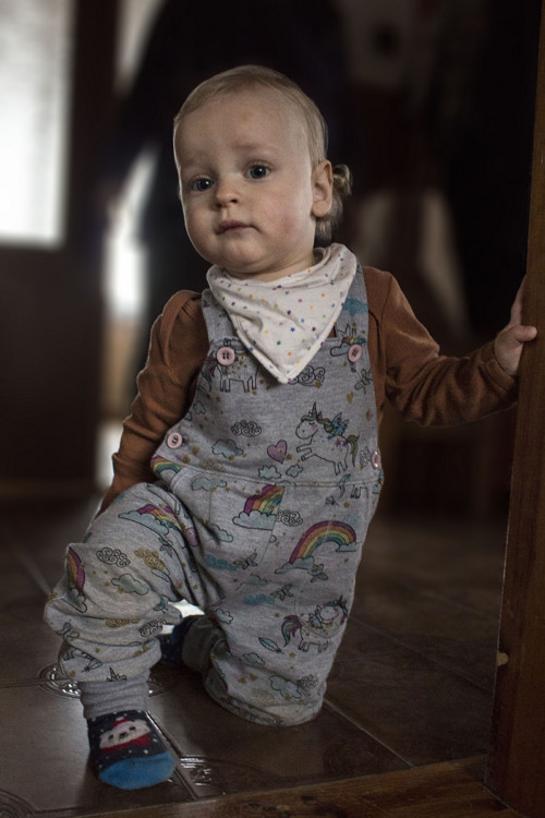 Pracovní kalhoty s laclem — foto 1