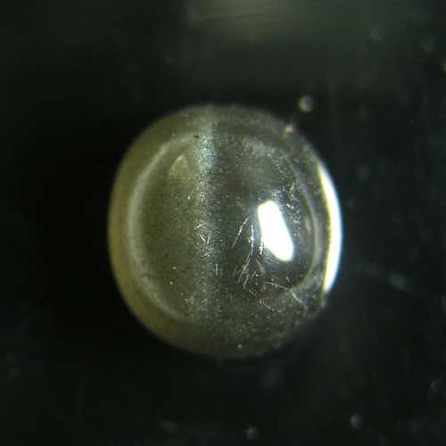 Skapolit, kočičí oko, 4,77 ct., 10,8x9,8x6,4 mm