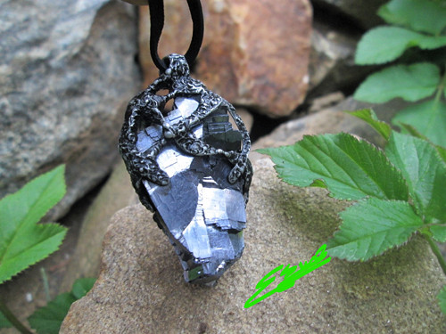 Talisman ,, Tenet " — foto 1