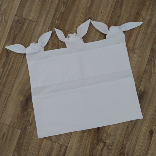 Široký kapsář na postýlku