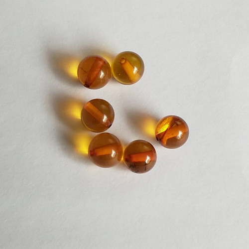 Jantar 22 korálky 7 mm, 1 kus