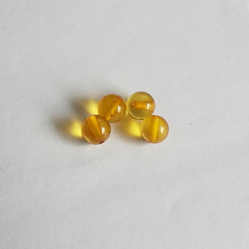 Jantar 23 korálky 7 mm, 1 kus