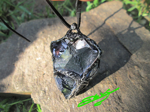 Talisman ,, Tenet " — foto 1