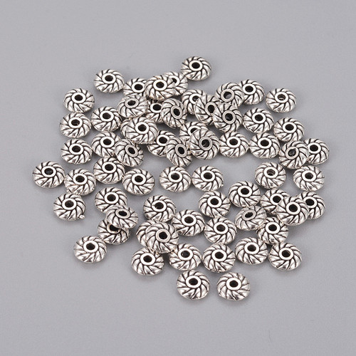Drobný ozdobný mezičlánek 6mm -10 ks
