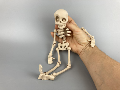 Kosťák - flexi figurka, béžová, 3D tisk — foto 1
