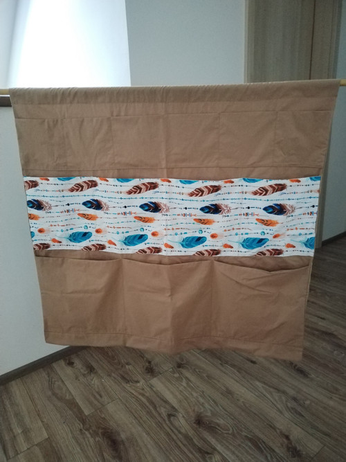 Široký kapsář s univerzálním použitím