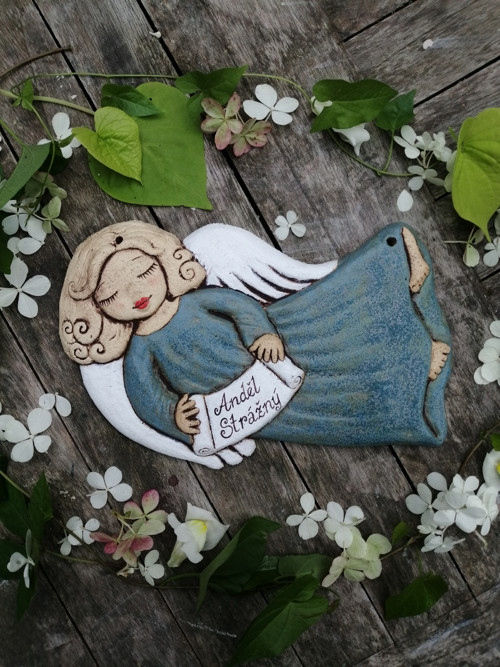 Andílek letící , reliéf — foto 1