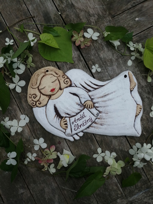 Andílek letící , reliéf — foto 1